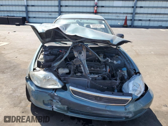 2000 Honda Civic VP z VIN 2HGEJ6613YH558116, wystawiony jako Copart lot #50028285 z przebiegiem 138 436 mil mil oraz Szkoda całkowita • Salvage title. Historia ofert i sprzedaży dostępna na DreamBid. Obrazek 5.