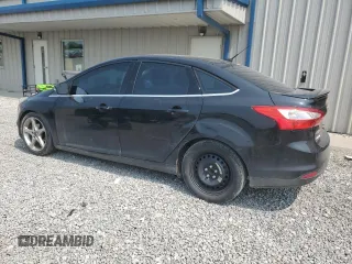 2014 Ford Focus Titanium with VIN 1FADP3J20EL347435, listed as a Copart auction lot 54947345 with 144,169 mi miles and Salvage title. Bid and sale history available at DreamBid. Image 2.
