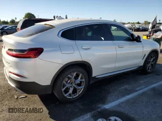 2020 BMW X4 xDrive30i with VIN 5UX2V1C09L9B97540, listed as a Copart auction lot 73984983 with 64,343 mi miles. Bid and sale history available at carsss.com. Image 3.
