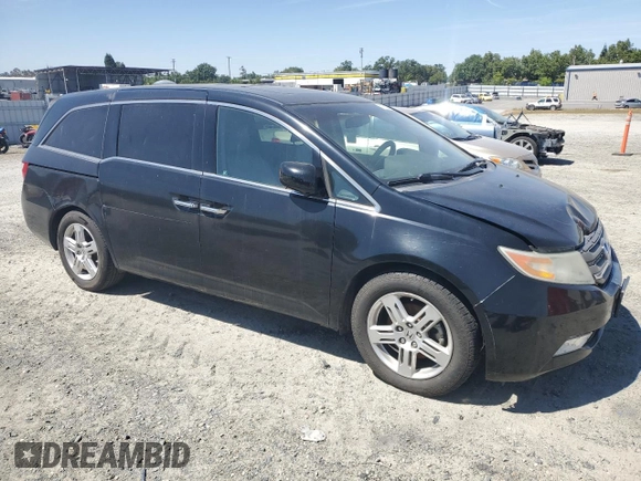 2012 Honda Odyssey Touring with VIN 5FNRL5H95CB004226, listed as a Copart auction lot 55775235 with 157,521 mi miles and Clean Title. Bid and sale history available at DreamBid. Image 4.