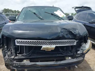 2010 Chevrolet Suburban LT with VIN 1GNUCJE06AR138587, listed as a IAAI auction lot 42145484 with 283,318 mi miles and . Bid and sale history available at DreamBid. Image 11.