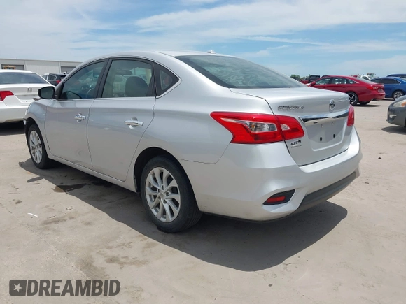 2019 Nissan Sentra SV z VIN 3N1AB7AP1KL604264, wystawiony jako IAAI lot #42304142 z przebiegiem 87 506 mil mil oraz . Historia ofert i sprzedaży dostępna na DreamBid. Obrazek 3.