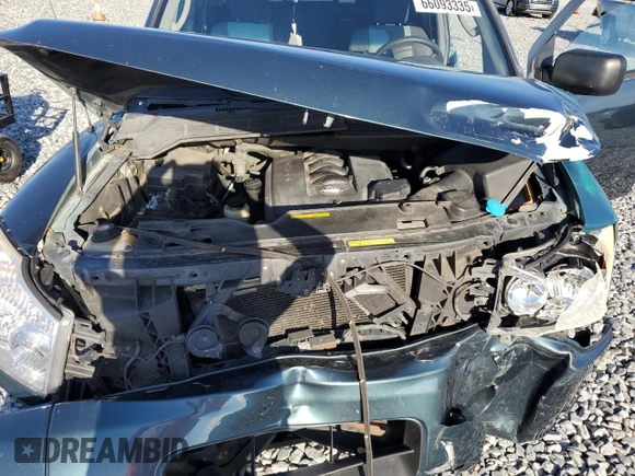 2004 Nissan Titan LE with VIN 1N6AA06AX4N569946, listed as a Copart auction lot 66093335 with Not provided miles and Salvage title. Bid and sale history available at DreamBid. Image 11.