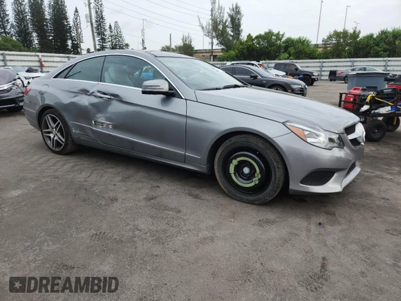 2014 Mercedes-Benz E 350 with VIN WDDKJ5KB5EF276363, listed as a Copart auction lot 61951425 with 71,154 mi miles and Salvage title. Bid and sale history available at DreamBid. Image 4.