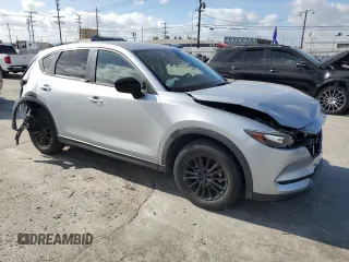 2019 Mazda CX-5 Touring with VIN JM3KFACMXK1556090, listed as a Copart auction lot 47541005 with 82,030 mi miles and Salvage Title. Bid and sale history available at carsss.com. Image 4.
