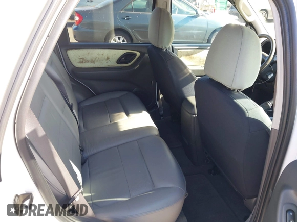 2006 Ford Escape XLT with VIN 1FMCU03116KA05836, listed as a IAAI auction lot 42310284 with 128,620 mi miles and . Bid and sale history available at DreamBid. Image 8.