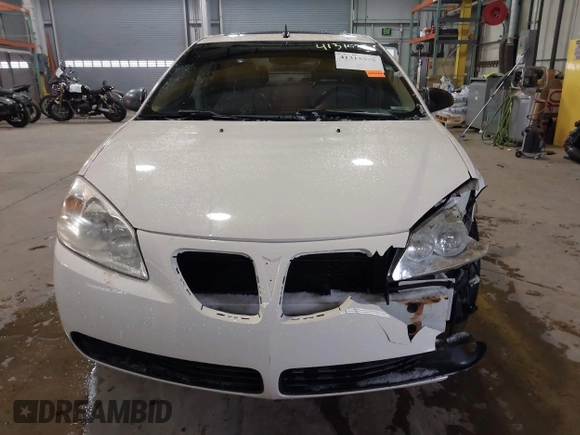 2006 Pontiac G6 GTP z VIN 1G2ZM571664226430, wystawiony jako IAAI lot #41315375 z przebiegiem 219 985 mil mil oraz . Historia ofert i sprzedaży dostępna na DreamBid. Obrazek 12.