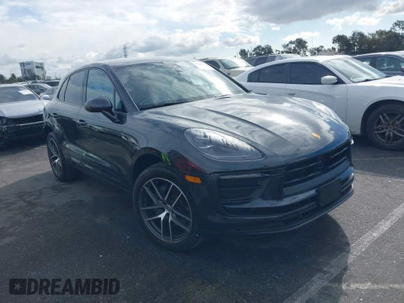 2023 Porsche Macan with VIN WP1AA2A51PLB10005, listed as a IAAI auction lot 41414974 with 15,955 mi miles. Bid and sale history available at carsss.com. Image 1.