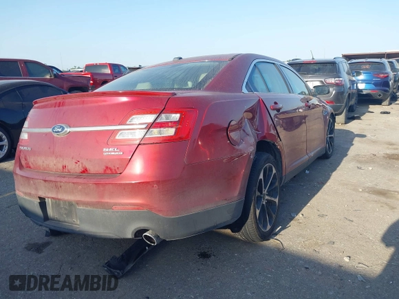 2014 Ford Taurus SEL with VIN 1FAHP2E80EG159131, listed as a IAAI auction lot 42004296 with 140,213 mi miles and . Bid and sale history available at DreamBid. Image 4.
