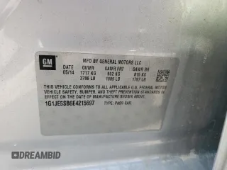 2014 Chevrolet Sonic LTZ z VIN 1G1JE5SB6E4215697, wystawiony jako Copart lot #70820024 z przebiegiem 166 414 mil mil oraz Szkoda całkowita • Salvage title. Historia ofert i sprzedaży dostępna na DreamBid. Obrazek 13.