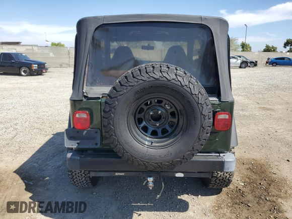 1997 Jeep Wrangler SE with VIN 1J4FY29P0VP521856, listed as a Copart auction lot 53396485 with 173,138 mi miles and Salvage Title. Bid and sale history available at carsss.com. Image 6.