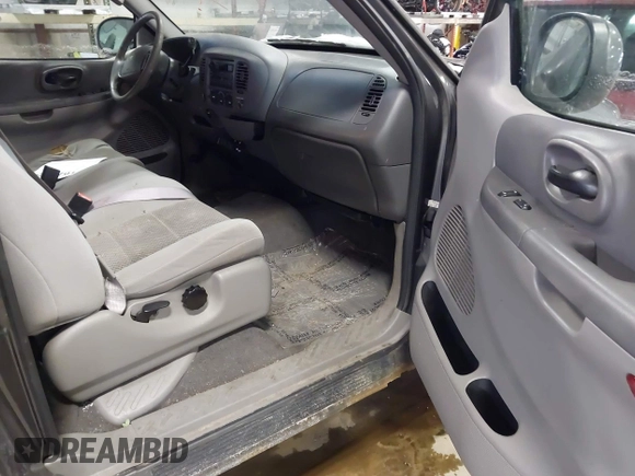 2003 Ford F-150 XL with VIN 1FTRX18W63NB69173, listed as a IAAI auction lot 41618645 with 219,506 mi miles. Bid and sale history available at carsss.com. Image 5.
