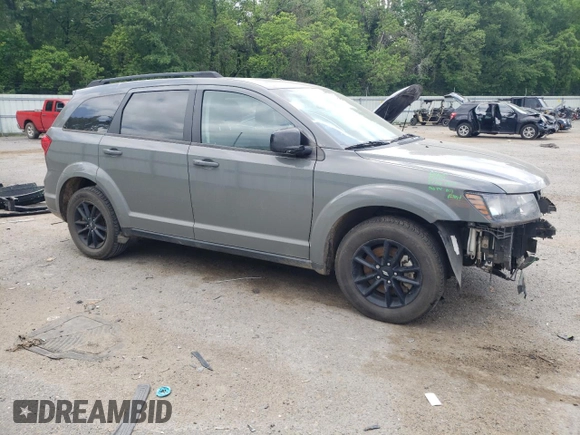2019 Dodge Journey SE with VIN 3C4PDCBB0KT875474, listed as a Copart auction lot 52987395 with 76,816 mi miles and Salvage Title. Bid and sale history available at DreamBid. Image 4.