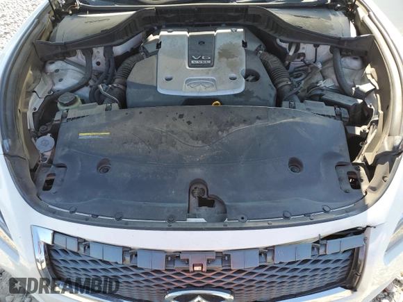 2015 Infiniti Q70 z VIN JN1BY1PP0FM601942, wystawiony jako Copart lot #68659924 z przebiegiem Nie podano mil oraz Szkoda całkowita • Salvage title. Historia ofert i sprzedaży dostępna na DreamBid. Obrazek 11.