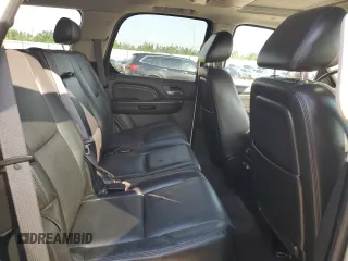 2009 Cadillac Escalade z VIN 1GYFK43559R235239, wystawiony jako Copart lot #59569495 z przebiegiem 142 969 mil mil oraz Tytuł czysty. Historia ofert i sprzedaży dostępna na DreamBid. Obrazek 11.