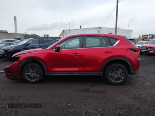 2019 Mazda CX-5 Sport with VIN JM3KFBBM7K1574764, listed as a IAAI auction lot 41276424 with 28,901 mi miles and . Bid and sale history available at carsss.com. Image 14.