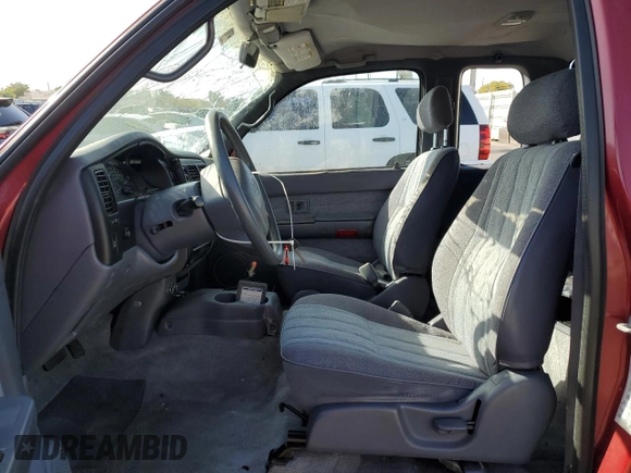 1999 Toyota Tacoma PreRunner with VIN 4TASN92NXXZ573027, listed as a Copart auction lot 48025455 with 111,854 mi miles and Salvage title. Bid and sale history available at DreamBid. Image 7.