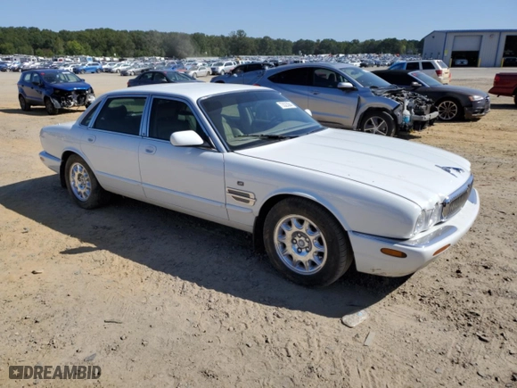 2000 Jaguar XJ with VIN SAJDA14C2YLF11720, listed as a Copart auction lot 73523584 with 119,188 mi miles and Clean Title. Bid and sale history available at carsss.com. Image 4.