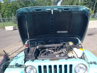 2002 Jeep Wrangler Sahara с VIN 1J4FA59S62P768112, выставлен на аукционе IAAI как лот 42657738 с пробегом 196 571 миль миль и . История ставок и продаж доступна на DreamBid. Изображение 10.