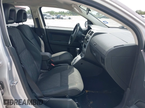 2008 Dodge Caliber SE with VIN 1B3HB28B98D757953, listed as a IAAI auction lot 42111663 with 115,977 mi miles. Bid and sale history available at carsss.com. Image 5.