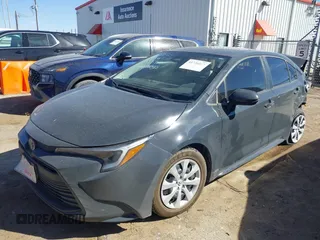 2023 Toyota Corolla Hybrid LE with VIN JTDBCMFE1P3020714, listed as a IAAI auction lot 41726065 with 28,539 mi miles. Bid and sale history available at carsss.com. Image 2.