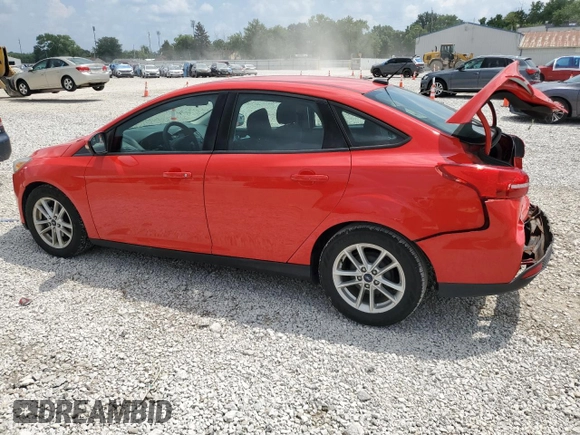 2015 Ford Focus SE with VIN 1FADP3F26FL346980, listed as a Copart auction lot 64567065 with 83,127 mi miles and Salvage title. Bid and sale history available at DreamBid. Image 2.