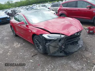 2018 Tesla Model S 75D with VIN 5YJSA1E21JF275546, listed as a IAAI auction lot 42061595 with Not Provided miles and . Bid and sale history available at DreamBid. Image 1.