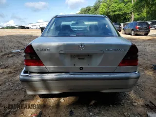 1999 Mercedes-Benz C 230/260/280/320 with VIN WDBHA24G4XA749633, listed as a Copart auction lot 56560105 with 221,306 mi miles and Salvage title. Bid and sale history available at DreamBid. Image 6.