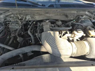 2001 Ford F-150 XLT с VIN 1FTRW07L11KF90642, выставлен на аукционе Copart как лот 64489205 с пробегом 242 959 миль миль и Списание • Salvage title. История ставок и продаж доступна на DreamBid. Изображение 7.