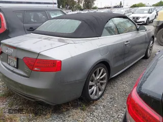 2015 Audi A5 Premium Plus z VIN WAUMFAFH6FN006946, wystawiony jako IAAI lot #42188356 z przebiegiem 147 402 mil mil oraz . Historia ofert i sprzedaży dostępna na DreamBid. Obrazek 4.