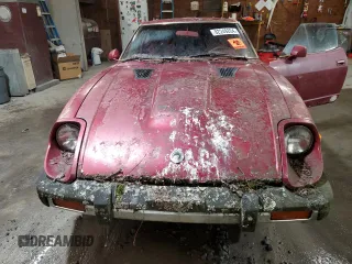 1981 Datsun 280ZX z VIN JN1HZ04S1BX414616, wystawiony jako Copart lot #82249204 z przebiegiem 114 028 mil mil oraz Tytuł czysty. Historia ofert i sprzedaży dostępna na DreamBid. Obrazek 11.