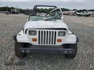 1990 Jeep Wrangler "S" with VIN 2J4FY19E6LJ528040, listed as a Copart auction lot 70989084 with 176,416 mi miles and Salvage Title. Bid and sale history available at carsss.com. Image 5.