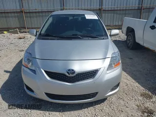 2009 Toyota Yaris with VIN JTDBT903X91301963, listed as a IAAI auction lot 42102283 with 143,966 mi miles. Bid and sale history available at carsss.com. Image 12.