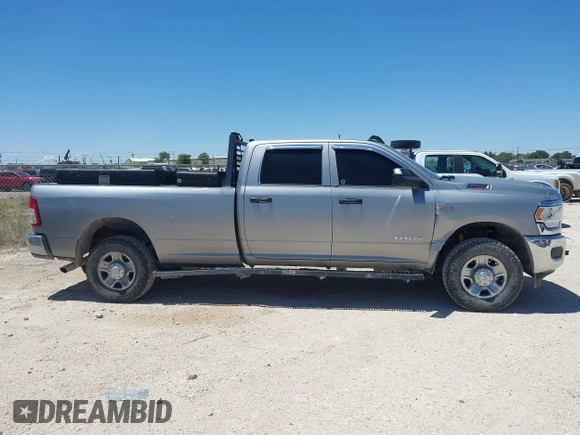 2022 Ram 2500 Tradesman z VIN 3C6UR5HJ7NG387674, wystawiony jako IAAI lot #42189557 z przebiegiem 125 045 mil mil oraz . Historia ofert i sprzedaży dostępna na DreamBid. Obrazek 13.