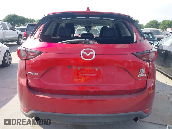2017 Mazda CX-5 Touring with VIN JM3KFACL3H0195212, listed as a IAAI auction lot 42041361 with 57,377 mi miles and . Bid and sale history available at carsss.com. Image 16.