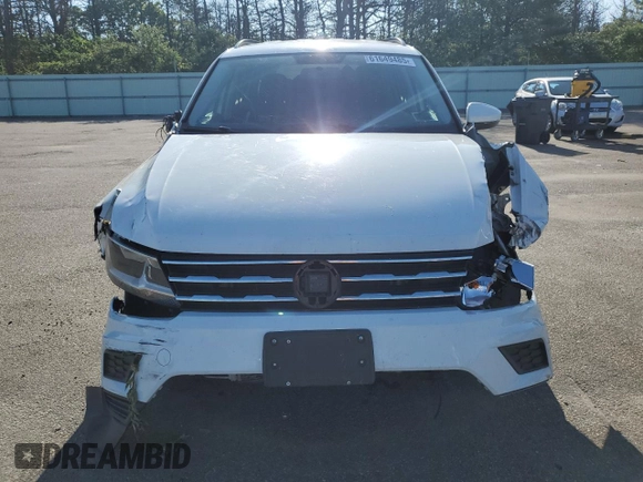 2020 Volkswagen Tiguan S with VIN 3VV1B7AX0LM037667, listed as a Copart auction lot 61649485 with 71,557 mi miles and Salvage title. Bid and sale history available at DreamBid. Image 5.