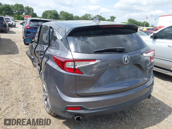 2021 Acura RDX Technology with VIN 5J8TC1H50ML003867, listed as a IAAI auction lot 42150473 with 55,426 mi miles and . Bid and sale history available at DreamBid. Image 3.