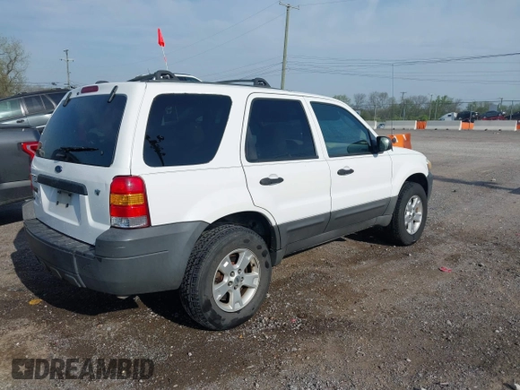 2005 Ford Escape XLT with VIN 1FMYU93145KD85599, listed as a IAAI auction lot 42036751 with 221,039 mi miles and . Bid and sale history available at DreamBid. Image 4.