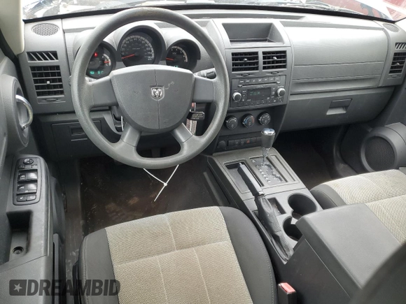 2009 Dodge Nitro SE with VIN 1D8GT28KX9W533248, listed as a Copart auction lot 70500994 with 124,091 mi miles and Salvage Title. Bid and sale history available at DreamBid. Image 8.