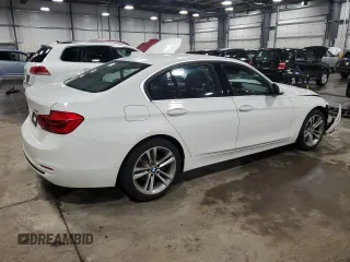 2018 BMW 3 Series 330i xDrive with VIN WBA8D9G5XJNU72561, listed as a Copart auction lot 55093355 with 28,411 mi miles and Salvage title. Bid and sale history available at DreamBid. Image 3.