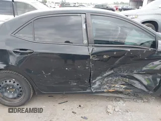 2015 Toyota Corolla L with VIN 5YFBURHE1FP212289, listed as a IAAI auction lot 42029067 with 147,377 mi miles and . Bid and sale history available at DreamBid. Image 6.