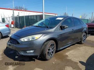 2015 Ford Focus SE with VIN 1FADP3F29FL268677, listed as a IAAI auction lot 42037244 with 118,018 mi miles. Bid and sale history available at carsss.com. Image 18.