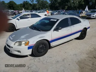 2002 Dodge Stratus SE z VIN 1B3EL36X02N306464, wystawiony jako Copart lot #61295865 z przebiegiem 42 520 mil mil oraz Czysty tytuł • Clean title. Historia ofert i sprzedaży dostępna na DreamBid. Obrazek 1.