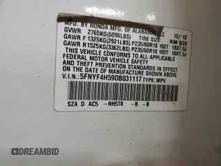 2013 Honda Pilot EX-L z VIN 5FNYF4H59DB031117, wystawiony jako Copart lot #60687635 z przebiegiem 140 565 mil mil oraz Szkoda całkowita • Salvage title. Historia ofert i sprzedaży dostępna na DreamBid. Obrazek 13.