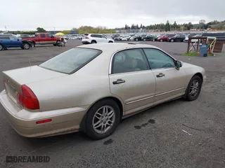 2000 Mitsubishi Diamante LS with VIN 6MMAP67P7YT005234, listed as a IAAI auction lot 41896098 with 131,852 mi miles. Bid and sale history available at carsss.com. Image 4.
