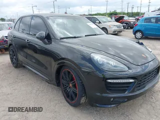 2014 Porsche Cayenne GTS z VIN WP1AD2A25ELA71350, wystawiony jako IAAI lot #42031766 z przebiegiem Nie podano mil oraz . Historia ofert i sprzedaży dostępna na DreamBid. Obrazek 1.