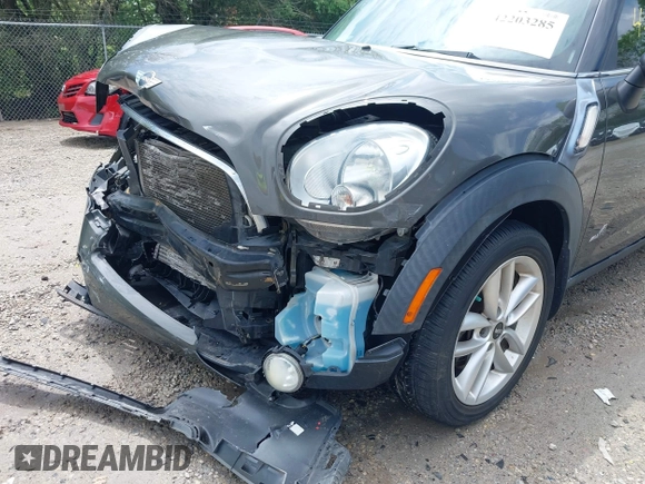 2013 MINI Countryman S ALL4 with VIN WMWZC5C58DWP30600, listed as a IAAI auction lot 42203285 with 76,796 mi miles and . Bid and sale history available at DreamBid. Image 18.