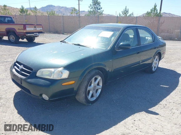 2000 Nissan Maxima GXE z VIN JN1CA31A8YT007617, wystawiony jako IAAI lot #42479039 z przebiegiem 165 950 mil mil oraz . Historia ofert i sprzedaży dostępna na DreamBid. Obrazek 2.