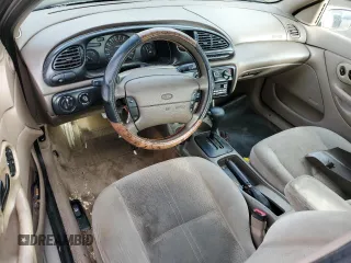 1998 Ford Contour SE z VIN 1FAFP6637WK280190, wystawiony jako Copart lot #84331424 z przebiegiem 185 754 mil mil oraz Czysty tytuł • Clean title. Historia ofert i sprzedaży dostępna na DreamBid. Obrazek 8.