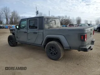 2023 Jeep Gladiator Willys z VIN 1C6HJTAG0PL507803, wystawiony jako Copart lot #48526875 z przebiegiem 51 811 mil mil oraz Czysty tytuł • Clean title. Historia ofert i sprzedaży dostępna na DreamBid. Obrazek 2.